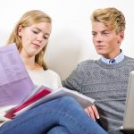 couple balancing high yield checking account