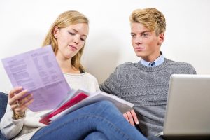 couple balancing high yield checking account