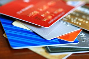 a close-up view of a colorful stack of credit cards